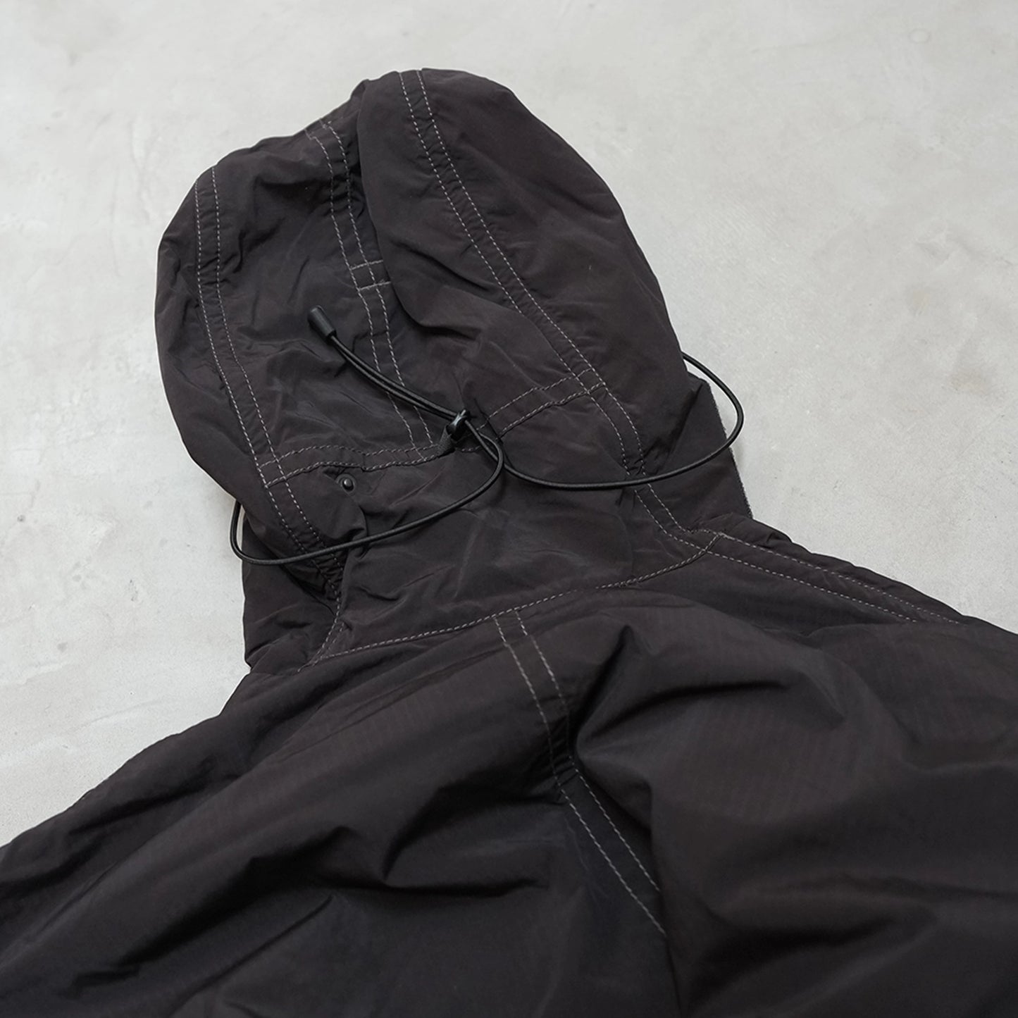 【and wander】アンドワンダー women's Fishtail Octa Coat "Black"