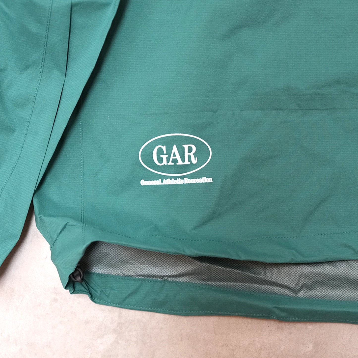 【THE NORTH FACE GAR】ザノースフェイス unisex GAR Light Rain Jacket "TNF Green"