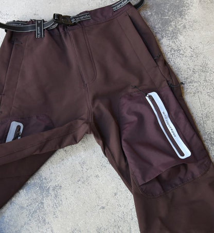 【and wander】アンドワンダー men's stretch shell pants "Brown"