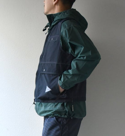 【and wander】アンドワンダー men's laser hole nylon taffeta vest "Charcoal"