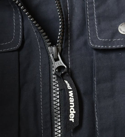 【and wander】アンドワンダー men's laser hole nylon taffeta vest "Charcoal"