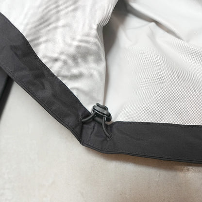 【and wander】アンドワンダー men's 2.5L hiker rain jacket "Black"