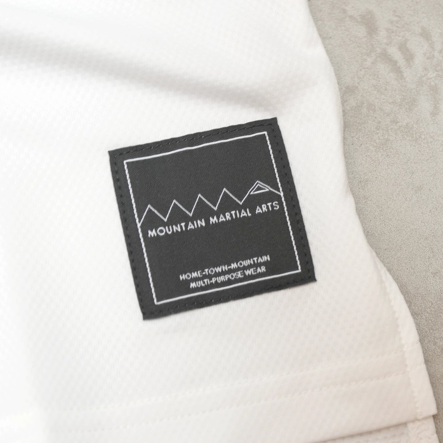 【Mountain Martial Arts】マウンテンマーシャルアーツ unisex MMA College Tee 2025 "2Color" ※ネコポス可